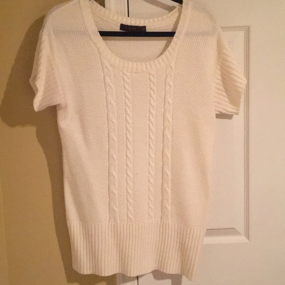 Cable knit sweater.